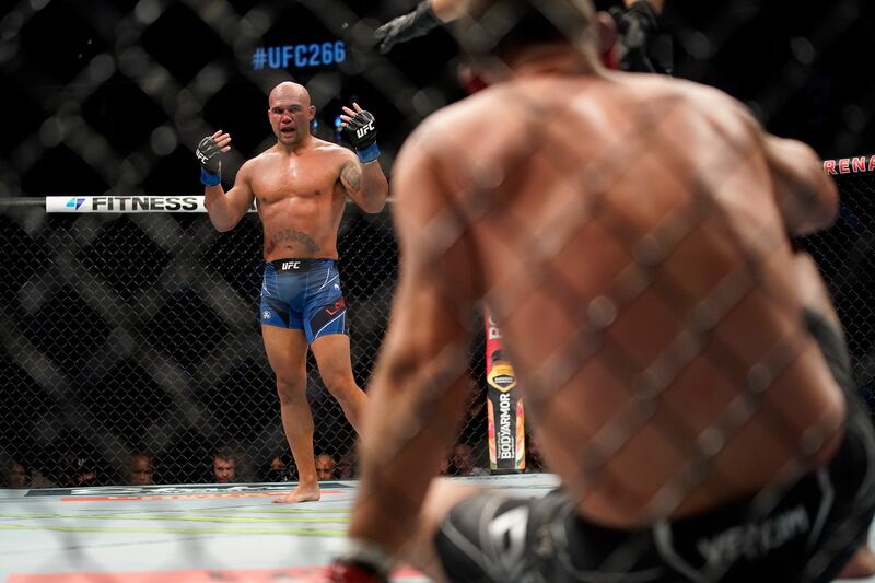 Robbie Lawler, left, reacts after knocking down Nick Diaz. AP Photo