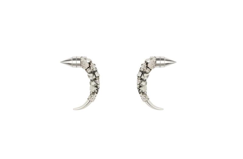 Earrings: Dh1,460, Givenchy. Photo by Ricardo Tisci / Givenchy