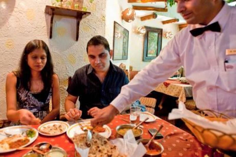 Suresh Bhura and his wife Anju having dinner at the vegetarian restaurant Govinda Govindas in Dubai, United Arab Emirates on Monday, Sept. 05, 2011. Photo: Charles Crowell for The National