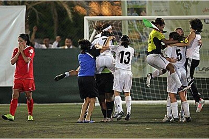 The UAE women's seven-a-side football team celebrate after winning the Armed Forces Officers Club 13th Open Sports Festival tournament.