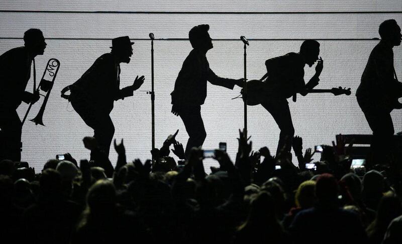 Bruno Mars performs during the halftime show of the Super Bowl. Mark Humphrey / AP 