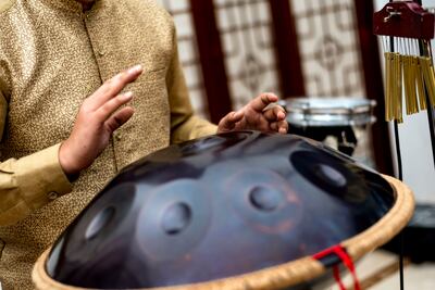 A musician on the handpan drum at the Saigon Social brunch