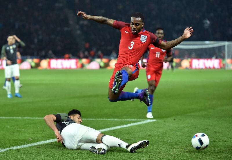 Danny Rose of England is tackled by Emre Can of Germany during the International Friendly match between Germany and England at Olympiastadion on March 26, 2016 in Berlin, Germany.  (Photo by Stuart Franklin/Bongarts/Getty Images)