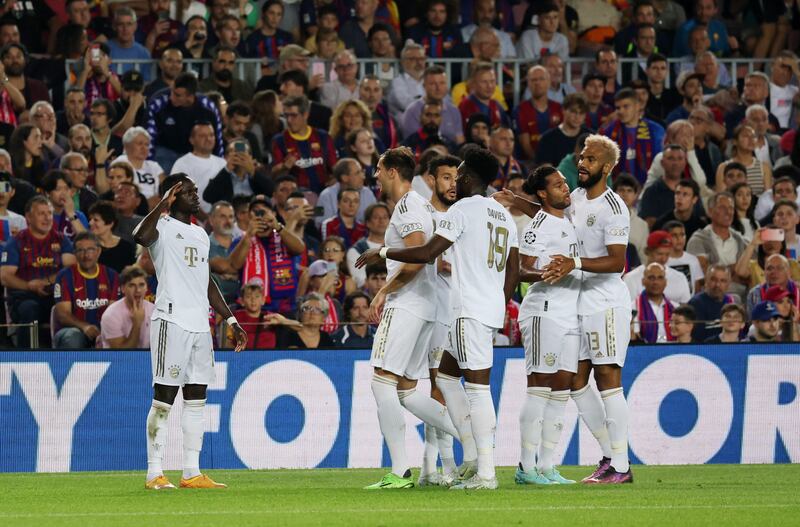  Sadio Mane celebrates scoring their first goal with teammates. Reuters