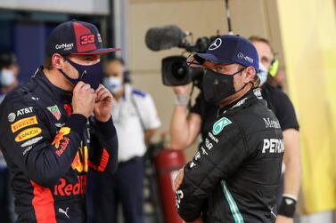 Red Bull's Max Verstappen, left, and Mercedes driver Valtteri Bottas, right, are in a battle for second place in the F1 drivers' standings. EPA