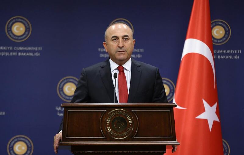 Turkish Foreign Minister Mevlut Cavusoglu gives a press conference in Ankara on July 25. AFP Photo

