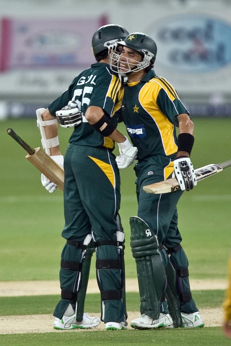 United Arab Emirates -Dubai- April 22, 2009:

SPORTS: Pakistan's Umer Gul, left, and Misbah Ul Haq, right, congratulate each other after the team beat Australia at the end of the Chapal Cup at the Dubai Sports City stadium in Dubai on Wednesday, April 22, 2009. Amy Leang/The National
 *** Local Caption ***  amy_042209_cricket_24.jpg