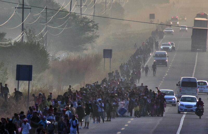 Migrants from across South America walk towards the border with the US, in Chiapas State, Mexico. AFP