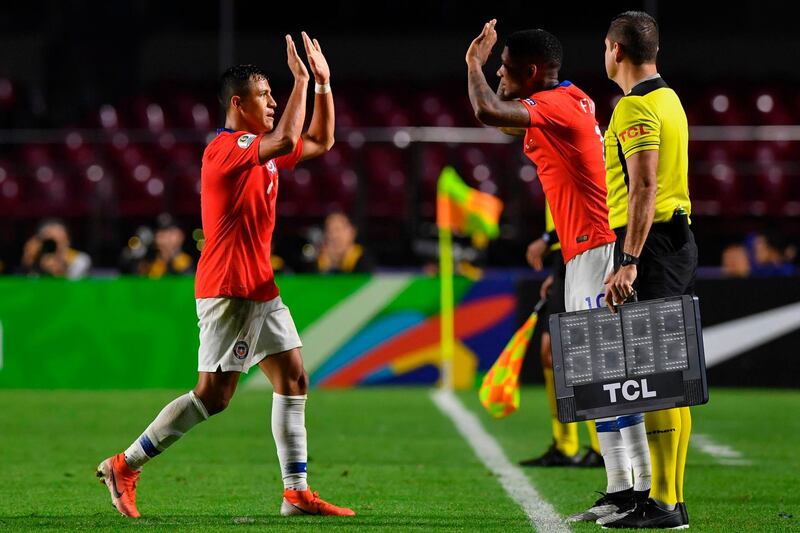 Chile's Alexis Sanchez is substituted by Chile's Junior Fernandes. AFP