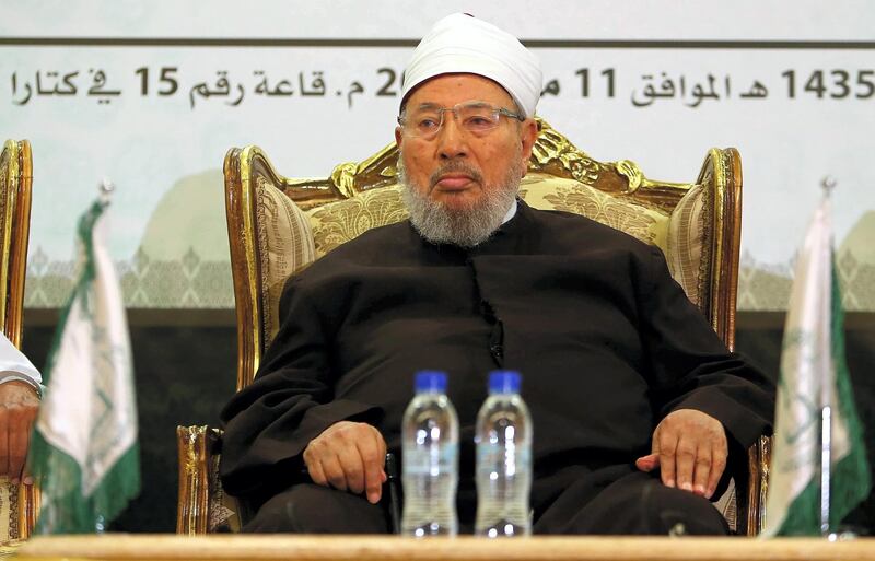 Egyptian Cleric and chairman of the International Union of Muslim Scholars Sheikh Yusuf al-Qaradawi attends a seminar entitled 'Jerusalem and Al-Aqsa between conspiracy and confrontation' in the Qatari capital Doha on May 11, 2014. AFP PHOTO/AL-WATAN DOHA/KARIM JAAFAR == QATAR OUT == (Photo by KARIM JAAFAR / AL-WATAN DOHA / AFP)