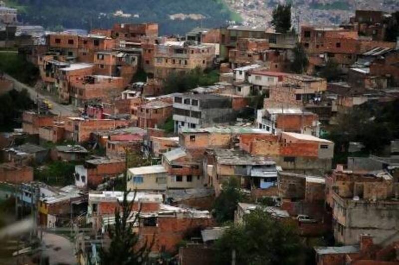 Part of the transformation of shantytowns, such as this one in Bogota, are infrastructural improvements such as the outdoor escalators in Medellin that allow residents to commute to the city centre. Juan BARRETO / AFP PHOTO