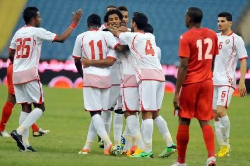 The UAE, in white, surrendered a three-goal lead against Trinidad and Tobago in their last game before prevailing on penalties to set-up Monday's championship game against New Zealand. Fayez Nureldine / AFP