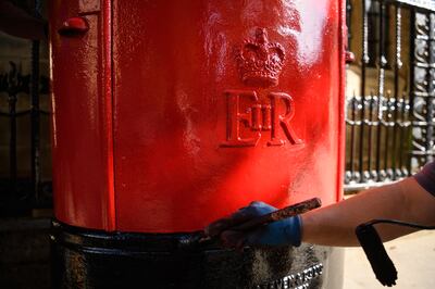 A Royal Mail postbox with the cypher of the late monarch, Queen Elizabeth II. Getty