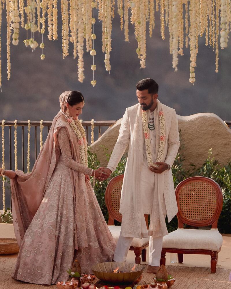 The bride and groom wore outfits designed by Anamika Khanna. Photo: Instagram / klrahul