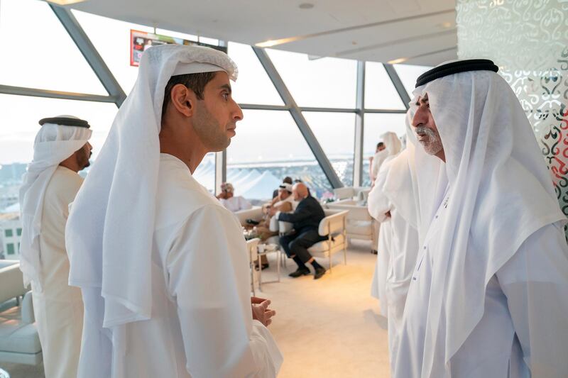 YAS ISLAND, ABU DHABI, UNITED ARAB EMIRATES - December 01, 2019: (L-R) HH Sheikh Khaled bin Zayed Al Nahyan, Chairman of the Board of Zayed Higher Organization for Humanitarian Care and Special Needs (ZHO) and HH Sheikh Nahyan bin Mubarak Al Nahyan, UAE Minister of State for Tolerance, attend the final day of the 2019 Formula 1 Etihad Airways Abu Dhabi Grand Prix, at Shams Tower.

( Ryan Carter for the Ministry of Presidential Affairs )
---