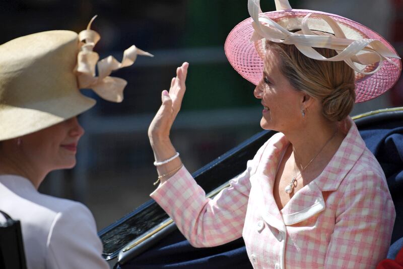 Sophie, Countess of Wessex, wears a pink gingham dress coat with a pink hat. Getty Images 