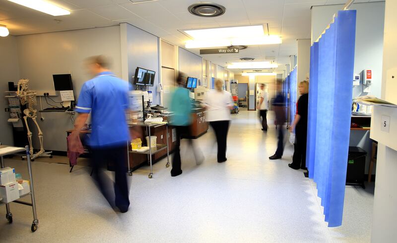 An NHS hospital ward. The UK health system needs more physical resources such as hospital beds, a report has said. PA