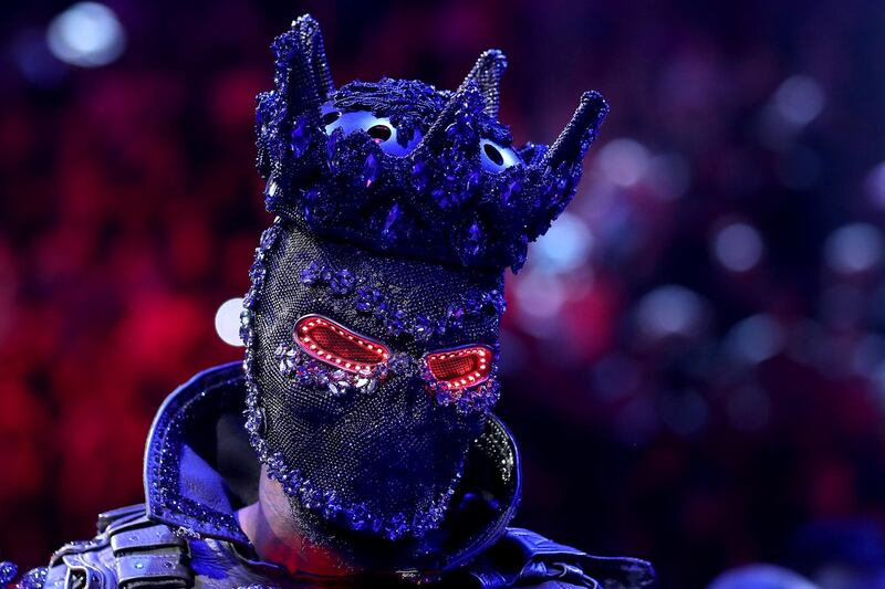 Deontay Wilder enters the ring prior to the Heavyweight bout wearing a design by Cosmo & Donato. AFP