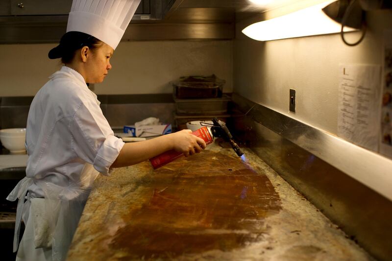 Abu Dhabi, United Arab Emirates, July 15, 2013:     Chefs work in the pastry kitchen at Emirates Palace in Abu Dhabi on July 15, 2013. Christopher Pike / The National

Reporter: GILLIAN DUNCAN *** Local Caption ***  CP0715-emirates palace035.JPG