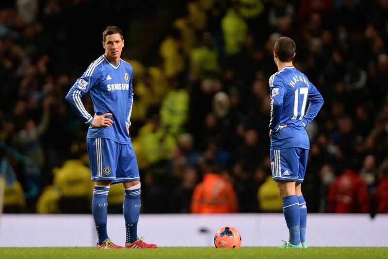 Chelsea's Fernando Torres, left, and Hazard react after Manchester City's second goal on Saturday. Peter Powell / EPA