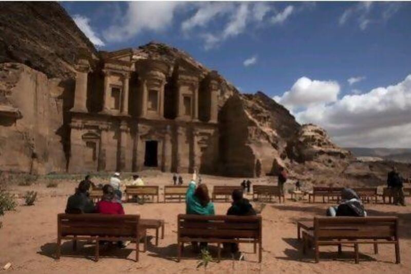 Petra, in Jordon, normally draws in more than 500,000 tourists each year. But visitors have reduced and the locals blame unrest in the region. Menahem Kahana / AFP