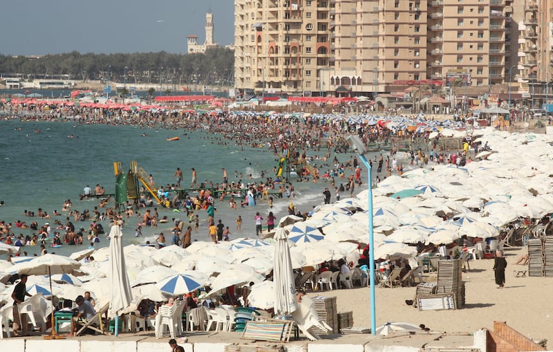 Crowded beaches line the shore of the Meditaranean Sea in Alexandria. August 10, 2009. Victoria Hazou