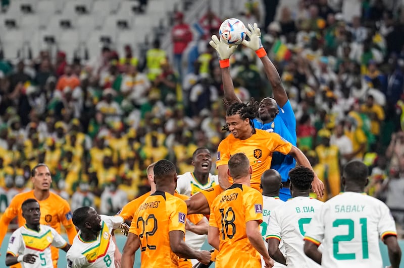 Senegal goalkeeper Edouard Mendy claims a high ball. AP 