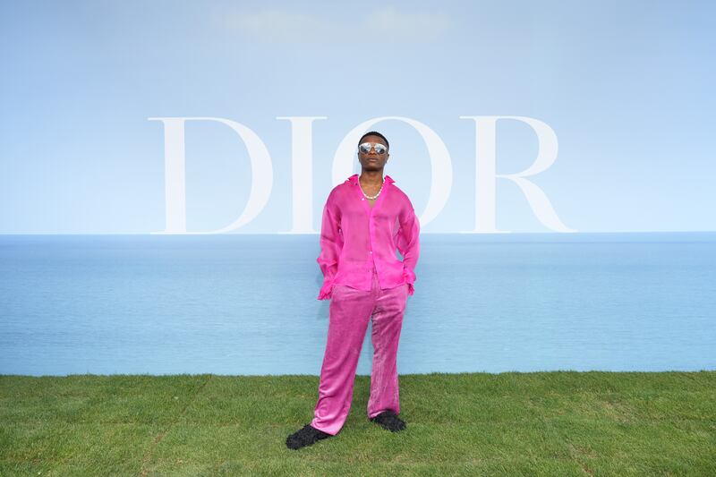 Nigerian singer-songwriter Wizkid attends the Dior Homme photocall. Getty Images For Christian Dior