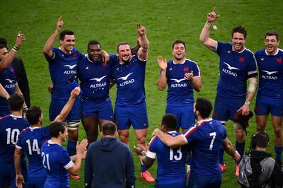 France's team players celebrate after winning at the end of the Six Nations rugby union tournament match between France and Ireland at the stade de France, in Saint Denis, on the outskirts of Paris, on October 31, 2020. / AFP / FRANCK FIFE
