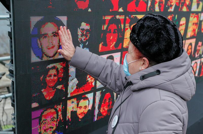 epaselect epa08926112 Relatives of crew members of the Ukraine International Airlines Flight PS752 which crashed near Tehran a year ago react during a commemorative ceremony in Kiev, Ukraine, 08 January 2021. A Ukrainian International Airlines passenger plane was downed by Iranian armed forces on 08 January 2020 near Tehran, killing all 176 people aboard, after allegedly mistaking it for an incoming missile.  EPA-EFE/SERGEY DOLZHENKO *** Local Caption *** 56607829