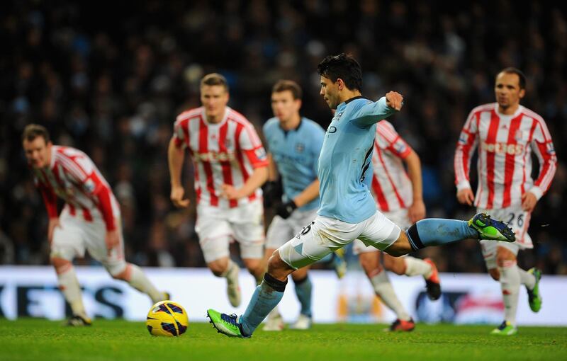 MANCHESTER, ENGLAND - JANUARY 01:  Sergio Aguero of Manchester City scores the third goal, from a penalty kick, during the Barclays Premier League match between Manchester City and Stoke City at the Etihad Stadium on January 1, 2013 in Manchester, England. (Photo by Michael Regan/Getty Images)