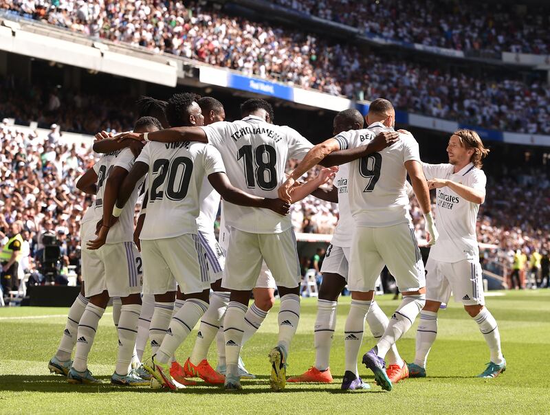 Vinicius Junior celebrates with teammates after scoring Real Madrid's opening goal. Getty Images