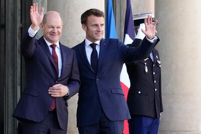 German Chancellor Olaf Scholz, left, andFrance's President Emmanuel Macron. The Franco-German axis remains strong within the EU. AP