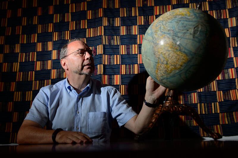 Professor Peter Piot, the Director of the London School of Hygiene and Tropical Medicine, poses for photographs following an interview at his office in central London, England, on July 30, 2014.  Professor Piot was one of the co-discoverers of the Ebola virus during its first outbreak in Zaire, in 1976.  AFP PHOTO/Leon NEAL (Photo by LEON NEAL / AFP)