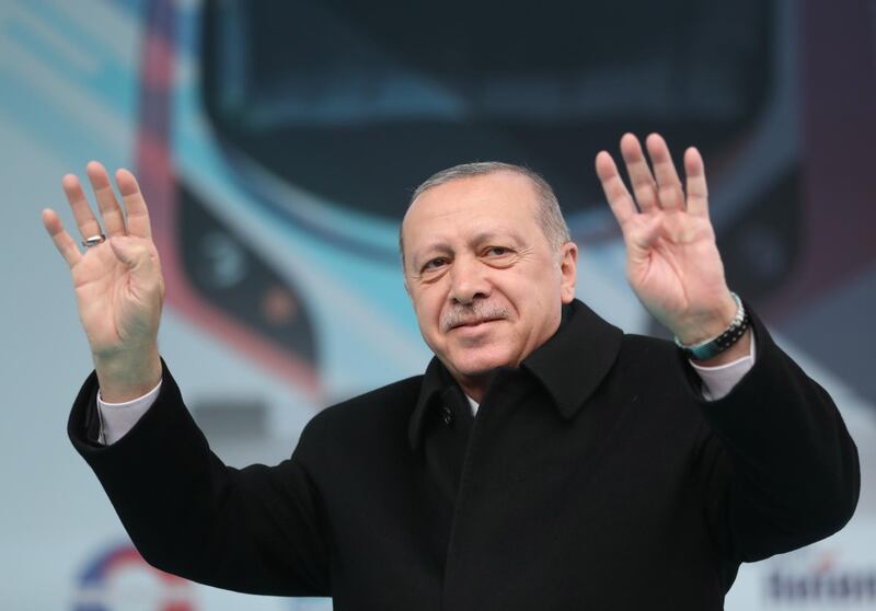 epa07431174 Turkish President Recep Tayyip Erdogan attends a local election rally of his Justice and Development Party (AK Party) and an opening ceremony of Gebze-Halkali suburban train line in Istanbul, Turkey, 12 March 2019. The Gebze-Halkali suburban line is 76-kelometer- long and it will take 115 minutes to pass through the Eurasia tunnel.  Local elections in Turkey's capital and the country's overall 81 provinces are scheduled for 31 March 2019.  EPA/ERDEM SAHIN