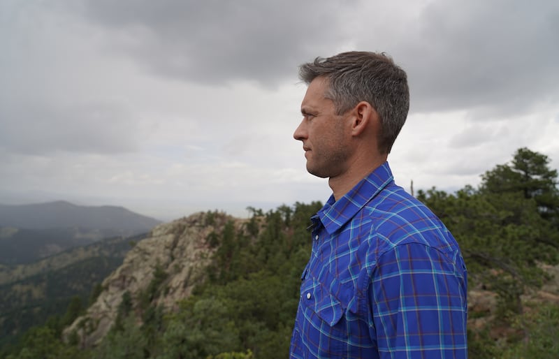 Keith Musselman, a scientist at the University of Colorado’s Institute of Arctic and Alpine Research, looks out towards the continental divide.