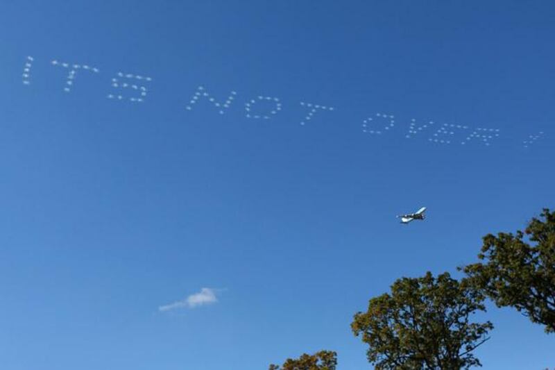 MEDINAH, IL - SEPTEMBER 30: A message of support for team Europe is written in the sky during the Singles Matches for The 39th Ryder Cup at Medinah Country Club on September 30, 2012 in Medinah, Illinois.   Mike Ehrmann/Getty Images/AFP== FOR NEWSPAPERS, INTERNET, TELCOS & TELEVISION USE ONLY ==


