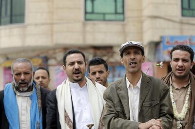 Members of the Baha'i faith demonstrate outside a state security court during a hearing in the case of a fellow Baha'i man charged with seeking to establish a base for the community in Yemen, in the country's capital Sanaa April 3, 2016.REUTERS/Khaled Abdullah