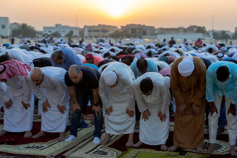 The first Eid prayer is performed at the Eid prayer ground in Al Barsha, Dubai. Chris Whiteoak / The National