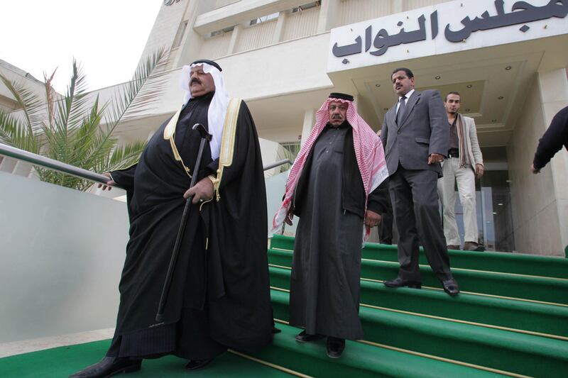 Jordanian MPs leave the parliament building in Amman. (Khalil Mazraawi / AFP Photo)