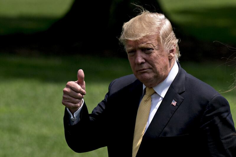 U.S. President Donald Trump gives a thumbs up while walking on the South Lawn of the White House after arriving on Marine One in Washington, D.C., U.S., on Tuesday, May 28, 2019. Trump rallied U.S. and Japanese troops to wrap up a four-day state visit that focused more on pageantry than resolving deep differences on trade between the long-standing allies. Photographer: Andrew Harrer/Bloomberg