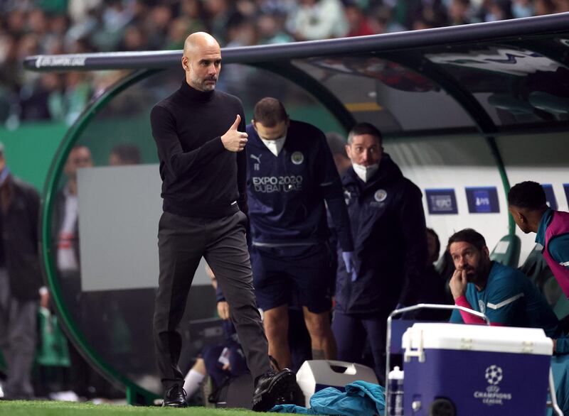 Manchester City manager Pep Guardiola celebrates after Bernardo Silva scored their second goal. Reuters