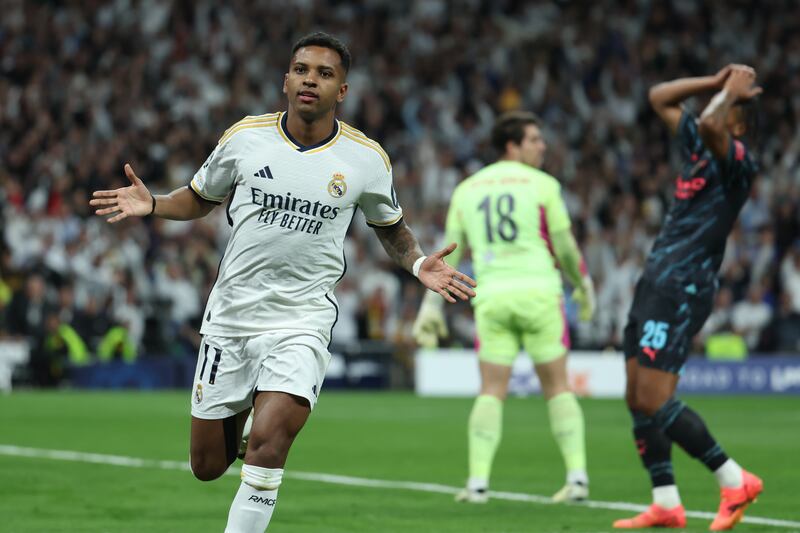Rodrygo celebrates after giving Real Madrid a 2-1 lead against Manchester City. EPA