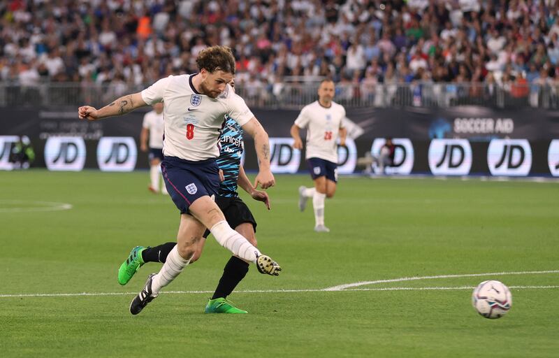 Tom Grennan scores Team England's second goal. Reuters
