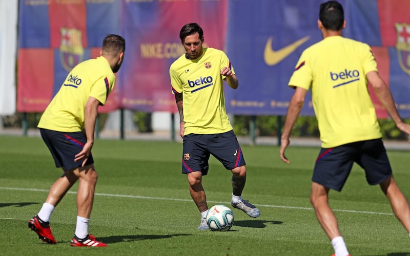 Lionel Messi controls the ball during a training session at Ciutat Esportiva Joan Gamper. Getty Images