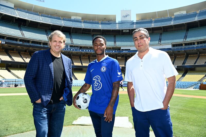 New signing Raheem Sterling with Chelseaco-owners Todd Boehly and Behdad Eghbali during a visit to Dodger Stadium in Los Angeles, California. 