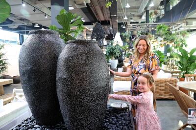 Lucy Holmes, Marketing Manager at The Garden Concept store with her daughter Daisy in Dubai. Pawan Singh / The National