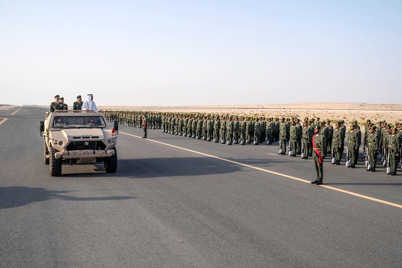 ZAYED MILITARY CITY, ABU DHABI, UNITED ARAB EMIRATES - November 28, 2017: HH Sheikh Mohamed bin Zayed Al Nahyan Crown Prince of Abu Dhabi Deputy Supreme Commander of the UAE Armed Forces (4th L), inspects the cadets during a graduation ceremony for the 8th cohort of National Service recruits and the 6th cohort of National Service volunteers at Zayed Military City. Seen with HE Lt General Hamad Thani Al Romaithi, Chief of Staff UAE Armed Forces (L) and Brigadier Faisal Mohamed Al Shehhi (3rd L).

( Hamad Al Kaabi / Crown Prince Court - Abu Dhabi )
—