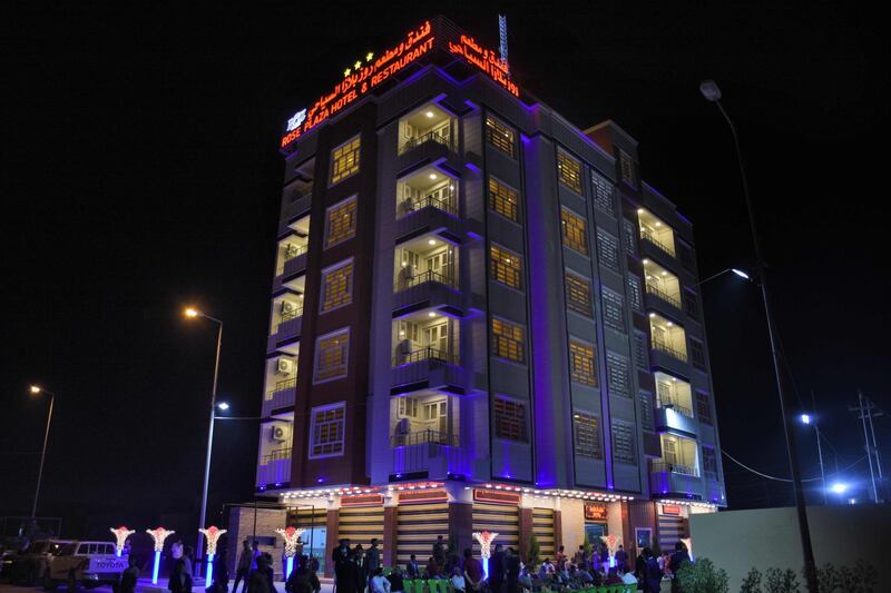 The Rose Plaza Hotel is pictured in Ramadi, the capital of Iraq's Anbar province on October 3, 2018. The 80-bed hotel, built by a young Iraqi businessman, has caused a stir in Anbar, the vast desert province to the west of Baghdad that extends to the borders with Syria, Jordan and Saudi Arabia,where locals traditionally welcome outsiders into their homes. / AFP / MOADH AL-DULAIMI
