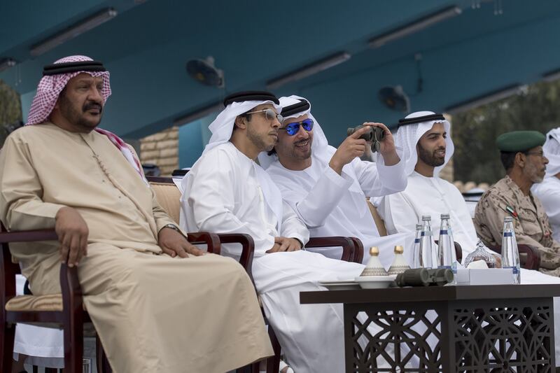 From left: Sheikh Saeed bin Mohammed Al Nahyan, Sheikh Mansour bin Zayed, Deputy Prime Minister and Minister of Presidential Affairs, Sheikh Hazza bin Zayed, Vice Chairman of the Abu Dhabi Executive Council, Sheikh Mohammed bin Saud Al Qasimi, Crown Prince and Deputy Ruler of Ras Al Khaimah, and Lt Gen Hamad Thani Al Romaithi, Chief of Staff, Armed Forces, attend the military exercise. Rashed Al Mansoori / Crown Prince Court - Abu Dhabi